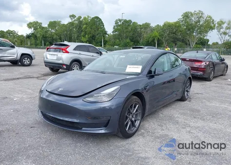 2021 Tesla Model 3 Standard Range Plus Rear-Wheel Drive from USA, damaged, VIN 5YJ3E1EA3MF058374